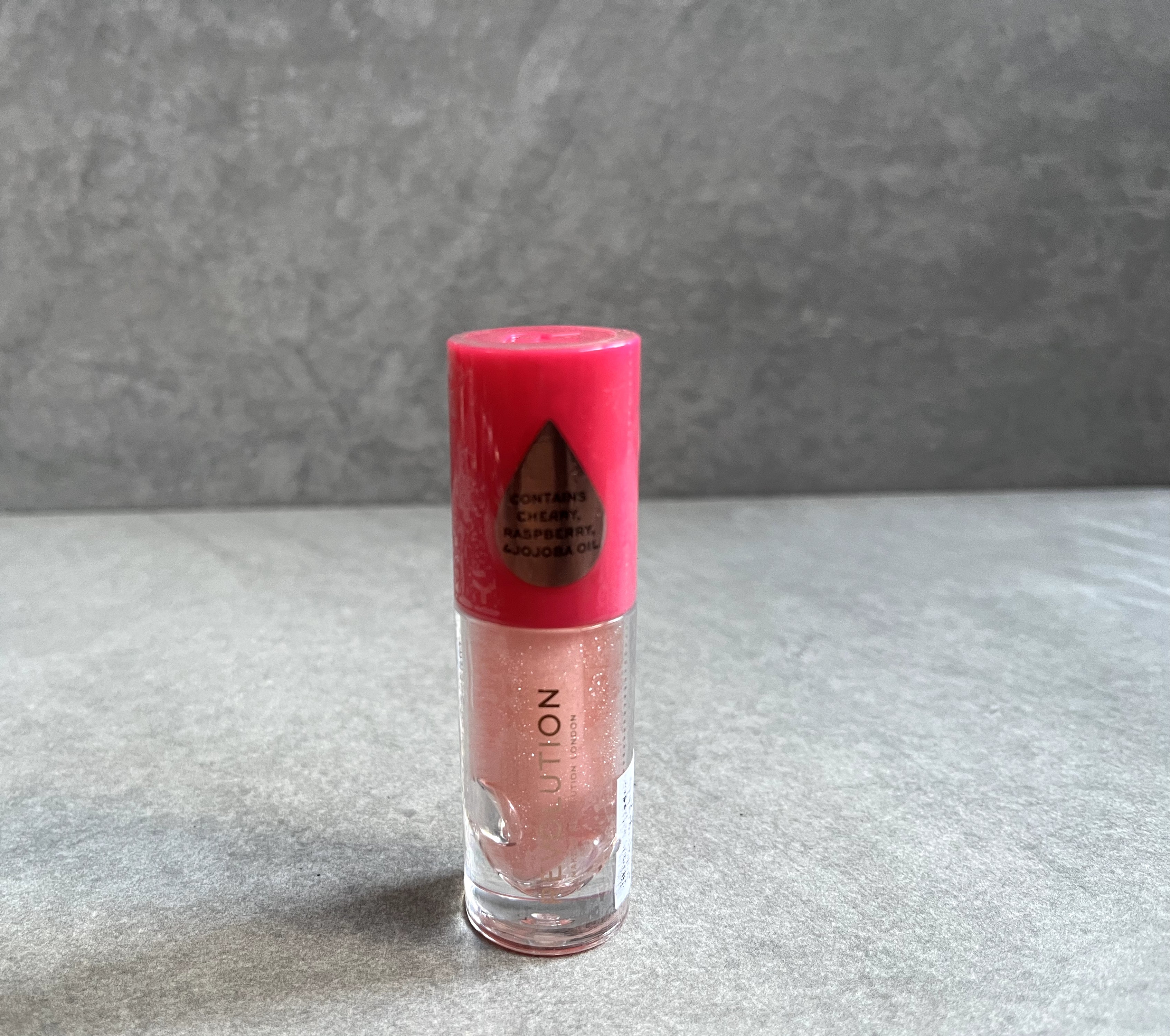 Revolution juicy bomb lip gloss